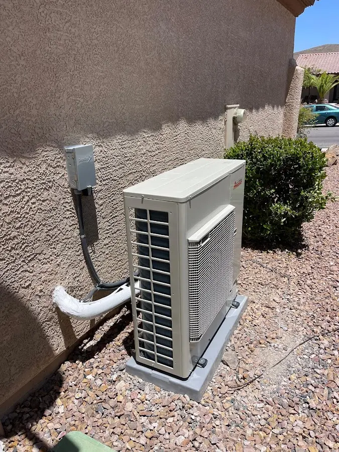 Residential air conditioning condenser unit in Little Chute